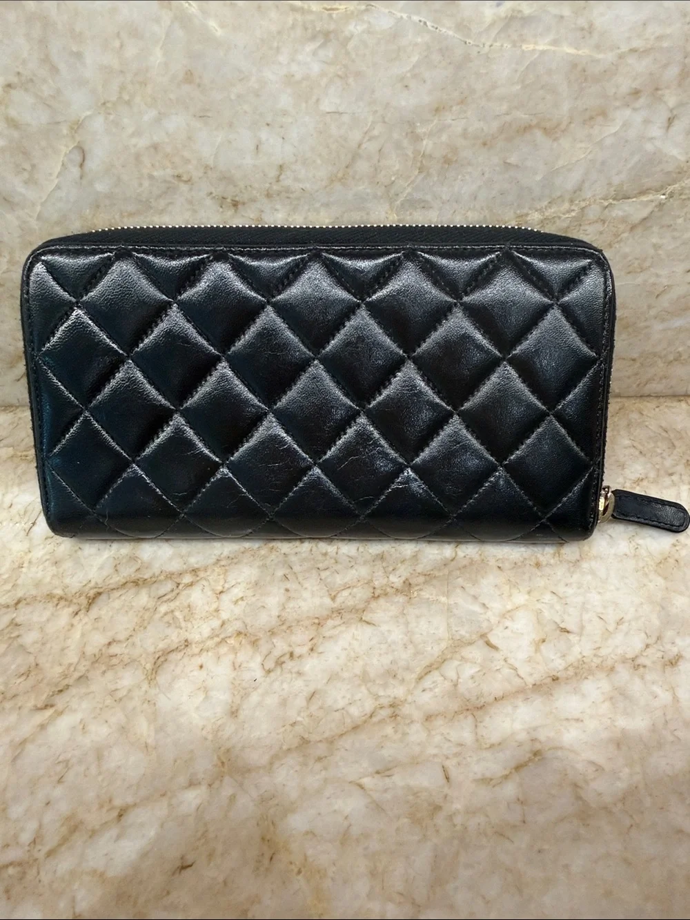 CHANEL Black Quilted Zip-Around Wallet with Gold CC